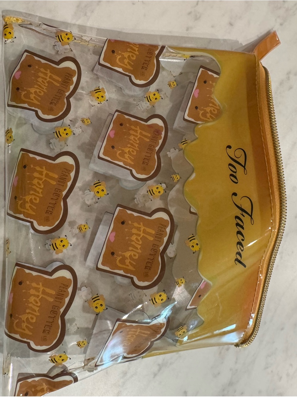 Too Faced Clear Cosmetic Pouch with Honey Toast and Bee Print - Yellow